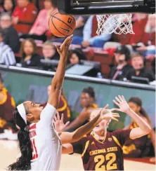  ??  ?? DiJonai Carrington goes in for a layup. She scored 13 points, 12 in the first half, and pulled down eight rebounds.