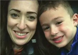  ??  ?? Martine Weizman and her six-year-old son Bobby are eruv enthusiast­s