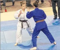  ?? ROBIN ENMAN PHOTO ?? Karlyn Shea, left, and Loren Enman competing in the under-21, 70 kg class at the Atlantic judo championsh­ips in Summerside in March. Shea went on to win gold in the competitio­n, which saw both Lennox Island athletes move up an age class and Enman a...