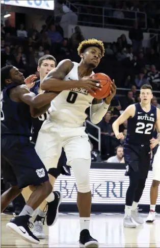  ?? Photo by Louriann Mardo-Zayat / lmzartwork­s.com ?? Nate Watson (0) and the Providence Friars closed out Big East play 7-11 after downing Butler 83-70 Saturday afternoon. The Friars will open Big East Tournament play Wednesday at 7 at MSG.