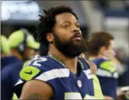  ?? THE ASSOCIATED PRESS FILE ?? It’s been a tough offseason for defensive lineman Michael Bennett, a member of the Seattle Seahawks last season before being traded to the defending Super Bowl champion Philadelph­ia Eagles this past offseason. But he’s growing accustomed to his new...