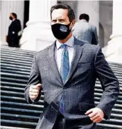  ?? TOM WILLIAMS/CQ-ROLL CALL ?? Rep. Rodney Davis, R-Ill., walks on the House steps of the Capitol on Feb. 26.