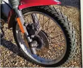  ??  ?? Single Brembo caliper grips the floating disc. Perfectly adequate braking, and even useful on loose surfaces, too