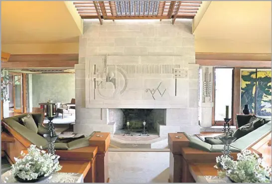  ?? Photograph­s by Christina House Los Angeles Times ?? VISITORS to Frank Lloyd Wright’s Hollyhock House in Barnsdall Park can now step into the sunken living room and get a closer look at the architect’s designs.