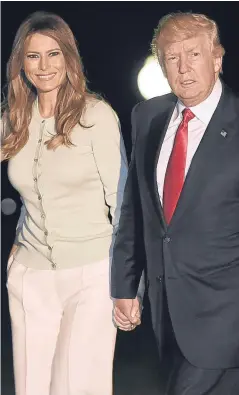  ?? Getty. ?? Donald Trump and First Lady Melania Trump return to the White House after his first overseas trip as president.