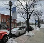  ?? MARAH MORRISON — THE NEWS-HERALD ?? Lighting remains important to downtown for safety, easy navigation in the evening and for aesthetics, said Tom Thielman, the city community developmen­t manager.