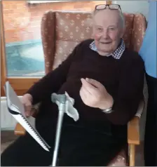  ??  ?? Tom Curtis enjoying a singalong at the Community Hospital, New Ross.