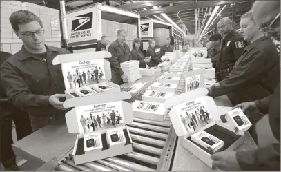  ??  ?? FLYING OUT THE DOOR: Trucks are being loaded with thousands of new medical alert devices called FastHelp. They are now being delivered to lucky seniors who call the National Rebate Center Hotline today. Everyone is calling to get FastHelp, the sleek new medical alert device because it instantly connects you to free unlimited help anytime, anywhere nationwide with no contracts, no deposits and no monthly bills ever.