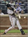  ?? AP PHOTO ?? San Francisco Giants’ Buster Posey hits an RBI double during the ninth inning against the New York Mets on June 11, 2015.