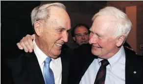  ??  ?? Frank McArdle, left, and Governor General David Johnston get chummy following the presentati­on of the Key to the City to Supreme Court of Canada Chief Justice Beverley McLachlin, to whom McArdle is married.