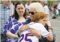  ??  ?? Vickie Showman hugs her mother Jackie Caulfield. Showman’s daughter Diana, who had a history of mental illness, was shot and killed by San Jose police as she emerged from a townhouse holding a drill which was mistaken for a gun.