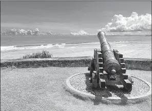  ?? AP/TASSANEE VEJPONGSA ?? A replica of cannons used during the Spanish occupation of Guam in the 19th century sits outside government offices in Hagatna. The small U.S. territory has become a focal point after North Korea threatened to use ballistic missiles around the island.