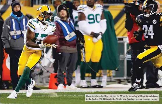  ?? | JUSTIN K. ALLER/ GETTY IMAGES ?? Davante Adams had five catches for 82 yards, including a 55- yard touchdown, in the Packers’ 31- 28 loss to the Steelers on Sunday.