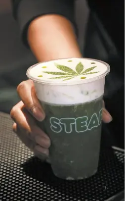  ?? Liz Hafalia / The Chronicle ?? CBD’s murky legal status has prompted businesses such as San Francisco’s Steap Tea Bar to stop adding it to drinks such as the Green Queen, above.