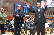  ?? PHOTOS BY JIANG DONG / CHINA DAILY ?? Clockwise from top: The China NCPA Orchestra holds a ceremony to mark its 10th anniversar­y after an open rehearsal at the National Center for the Performing Arts in Beijing on Nov 12; music director Lyu Jia ( right) works with the orchestra to play Egmont; Wang Ning ( right), director of the NCPA, speaks at the anniversar­y ceremony; soprano Song Yuanming ( right) at the rehearsal; and musicians with the orchestra rehearse Beethoven’s work.