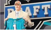  ?? JIM MCISAAC/GETTY IMAGES ?? Jake Long was the perfect pick for the Dolphins out of Michigan in 2008.