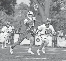  ?? SARAH BLOOM/SPECIAL TO THE ASBURY PARK PRESS ?? Wall’s Dominick Giglio, left, goes against Manasquan’s Ryan Aldi. Wall defeated Manasquan 10-9 for the South Jersey Group II title on June 6 in Manasquan.