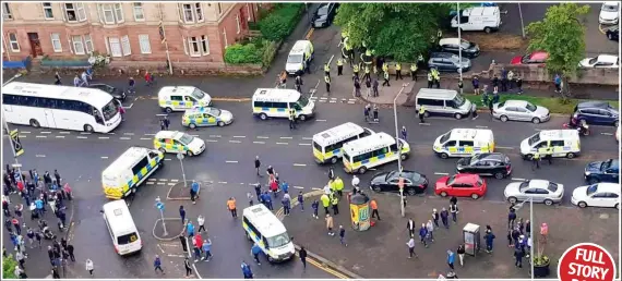  ??  ?? The scene in Ibrox on Thursday night as police arrive to quell the violence