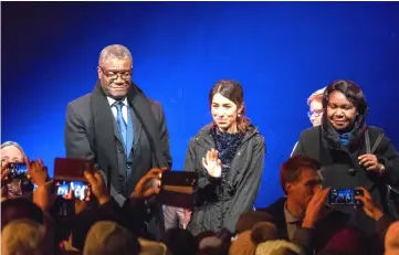  ?? — Reuters photo ?? (From left) Mukwege and Murad arrive at the Nobel outdoor concert in front of Oslo Town hall, after receiving the Nobel Peace Prize for their efforts to end the use of sexual violence as a weapon of war and armed conflict, in Oslo.