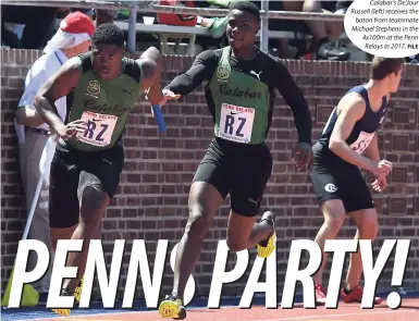  ?? FILE ?? Calabar’s De’Jour Russell (left) receives the baton from teammate Michael Stephens in the 4x100m at the Penn Relays in 2017.