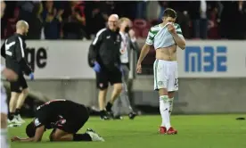  ?? Photograph: Bo Amstrup/Ritzau Scanpix/ AFP/Getty Images ?? Ryan Christie looks dejected at the final whistle.