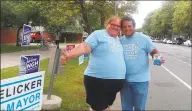  ?? Helen Bennett / Hearst Connecticu­t Media ?? Julie Anastasio and her fiance, Neftaly Otero, both supporters of Justin Elicker, outside the Ward 5 polling station in New Haven.