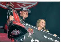  ?? Democrat-Gazette/Bryan Hendricks) ?? Dustin Connell celebrates Sunday with his wife Victoria after winning his second Redcrest Bass Fishing Championsh­ip at Lay Lake in Birmingham, Ala.
(Arkansas