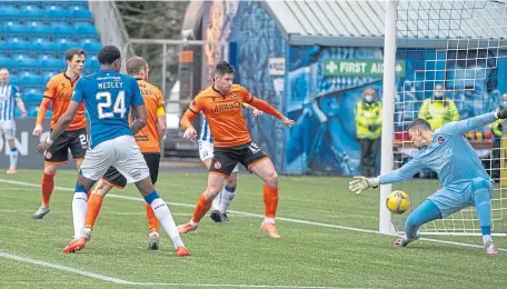  ??  ?? Zech Medley slots home Killie’s equaliser