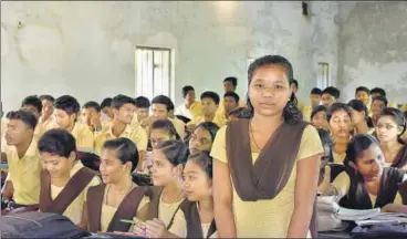  ?? VIPIN KUMAR/HT ?? Pinki Kandagaria, a member of the Dongria Kondh community, who studies at the Autonomous Goverment College in Rayagada.