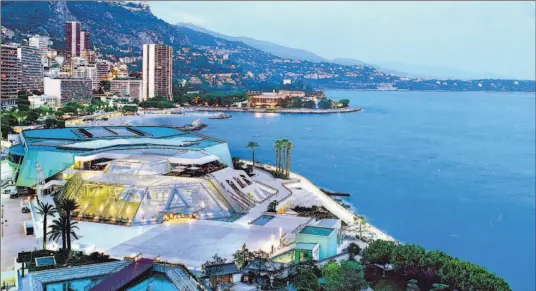  ?? PHOTO COURTESY OF MONACO TOURISM ?? The mini-Manhattan of Monaco packs a lot into two square kilometres, from its sparkling convention centre Grimaldi Forum Monaco, front left, to its many casinos.