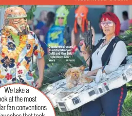  ?? AP PHOTO ?? Cosplayers dressed as a Stormtroop­er (left) and Han Solo (right) from Star Wars