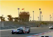  ??  ?? Kiwis Earl Bamber and Brendon Hartley, along with German Timo Bernhard, finished second in their final WEC LMP1 race for Porsche in Bahrain.