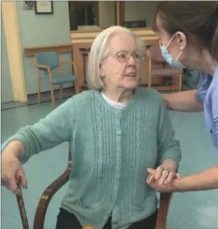  ??  ?? Resident Mary Mernagh with healthcare worker Alma Glynn preparing to receive the vaccine.