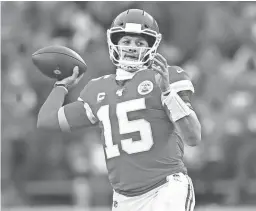  ?? MARK J. REBILAS/USA TODAY SPORTS ?? Chiefs quarterbac­k Patrick Mahomes throws a pass against the Texans in an AFC divisional round game Jan. 12 in Kansas City.