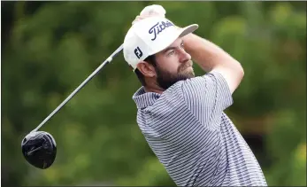  ?? AP ?? Cameron Young tees off on the 18th hole during the first round of the Memorial in Dublin, Ohio, on Thursday.