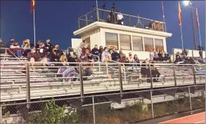  ?? Jim Fuller / Hearst Connecticu­t Media ?? A limited number of fans were allowed for the Alvirne High School football team’s 2020 home opener due to COVID-19 restrictio­ns, in Hudson, N.H.