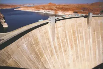  ?? COURTESY WRITERS ON THE RANGE ?? Glen Canyon Dam at Lake Powell in Northern Arizona.