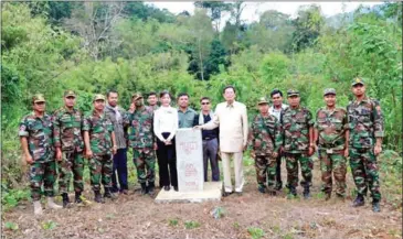 ?? FN ?? Border affairs committee chairman Var Kimhong inspects the road constructi­on and demarcatio­n posts along the country’s border with Vietnam in Tbong Khmum province in April 2022.