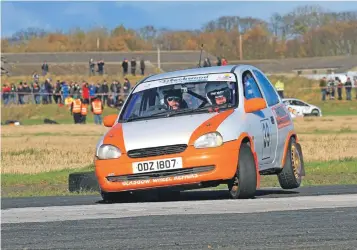  ??  ?? Ardrishaig’s Donald Bowness and Robin Nicholson in their Vauxhall Corsa snapped the back axle on Stage 2