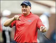  ?? AP File Photo/The Oxford Eagle/BRUCE NEWMAN ?? Rich Rodriguez is in his first season as offensive coordinato­r at Ole Miss after being the head coach at West Virginia, Michigan and Arizona. The Rebels, who had 173 yards of total offense in a season-opening loss to Memphis, host Arkansas on Saturday.