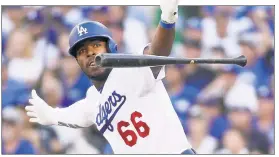  ?? EPA; Getty Images ?? A TEAM EFFORT: Clayton Kershaw (right) celebrates during his dominant seven-inning performanc­e in the Dodgers’ 5-2 victory in Game 5 of the NLDS against the Brewers, aided by an RBI single from Yasiel Puig (above) in the sixth inning.