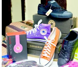  ?? KENYON HEMANS/PHOTOGRAPH­ER ?? Some of the counterfei­t goods seized by C-TOC and displayed at a press conference yesterday.