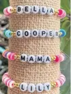  ?? ?? Among the most popular items Marlana Penney makes are her custom song lyric embroidery hoops. Recently, she started making custom name bracelets and those have been a hit as well.