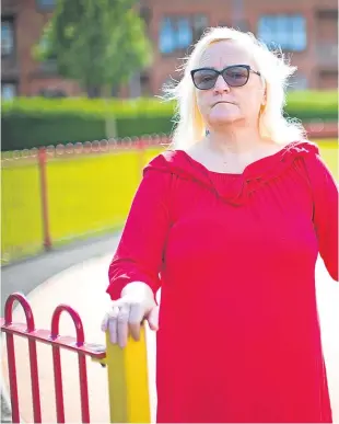  ??  ?? Marie Peachey, in a park in Glasgow last week, claims to have been beaten during her five years at Smyllum Park in the 1960s.