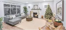  ??  ?? The Westhills Carriage Home Collection features traditiona­l living spaces for the modern family. Snuggle up by the natural-gas powered fireplace.