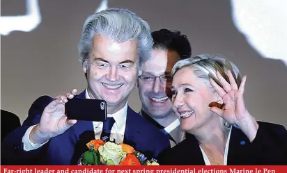  ??  ?? Far-right leader and candidate for next spring presidenti­al elections Marine le Pen from France, right, and Dutch populist anti-Islam lawmaker Geert Wilders stand together after their speeches during a meeting of European Nationalis­ts in Koblenz,...