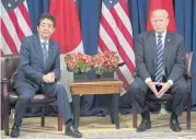  ??  ?? KEY ISSUES: Japanese Prime Minister Shinzo Abe meets with President Donald Trump in New York. Mr Trump will host Mr Abe at his Palm Beach estate on Tuesday amid tensions over North Korea and US tariffs.