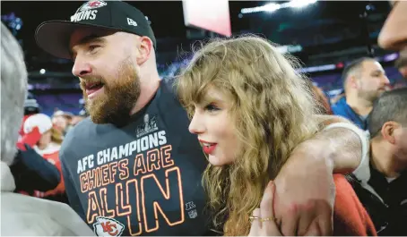  ?? PATRICK SMITH/GETTY ?? Travis Kelce celebrates with Taylor Swift after the Chiefs’ 17-10 victory over the Ravens in the AFC Championsh­ip Game on Jan. 28.