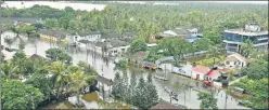  ?? RAJ K RAJ/HT PHOTO ?? ▪ A view of submerged houses in Kerala’s Alappuzha district. With the floodwater receding, the government is now shifting focus on rebuilding the infrastruc­ture after weeklong rescue operations ended.