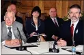  ??  ?? SEAT SOLUTION: Ian Paisley, far left, and Gerry Adams, far right, at Mr Hannigan’s diamond table